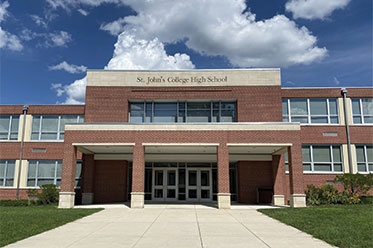 A school building. Links to Gifts by Estate Note