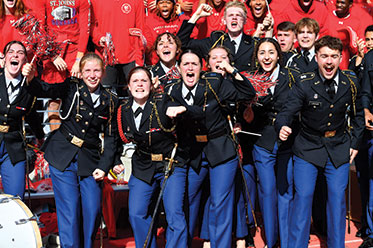 Students in military dress cheering with gusto. Links to Closely Held Business Stock Students in military dress cheering with gusto. Links to Closely Held Business Stock